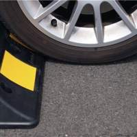 Wheel stop L500xW160xH100mm, PVC black with yellow reflective strips